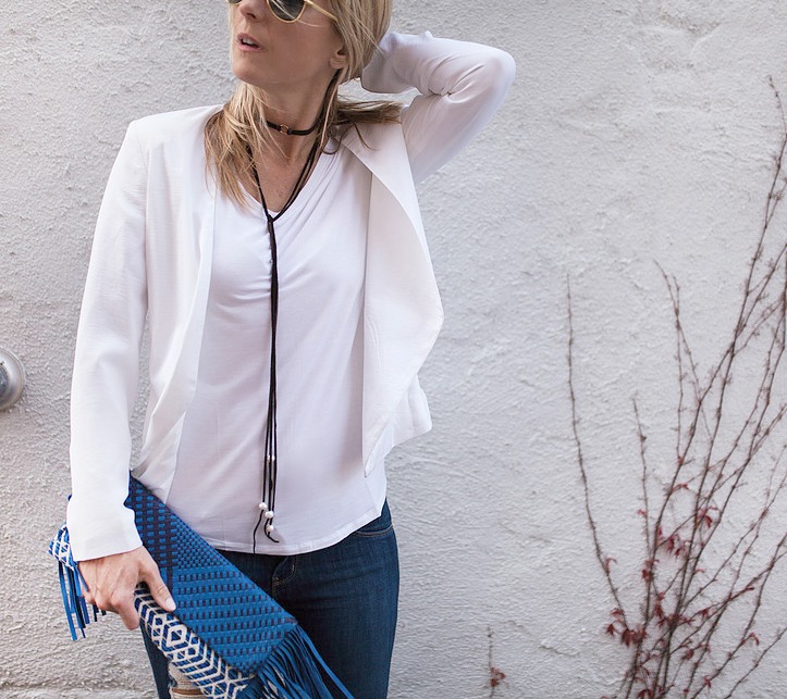 woman wearing white top and blazer, jeans, and Choker Trend woman wearing white top and blazer, jeans, and Choker Trend