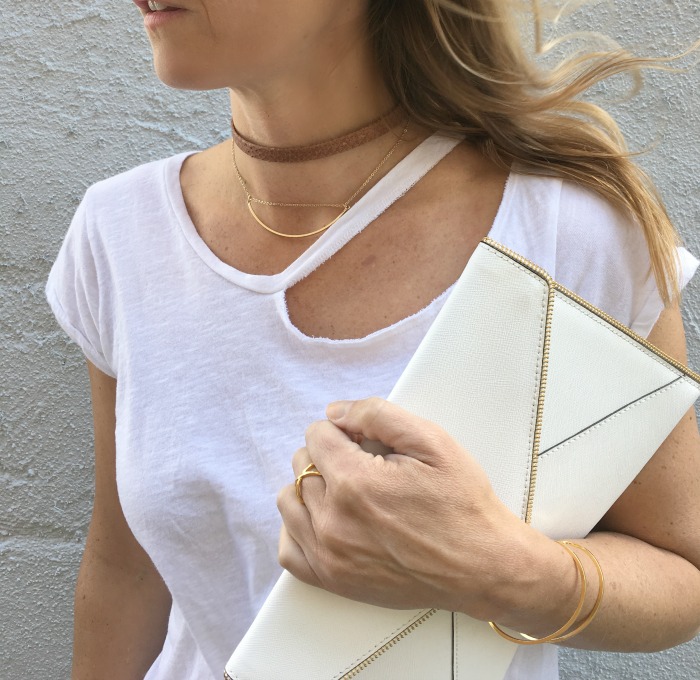 woman wearing white shirt and gold choker woman wearing white shirt and gold choker