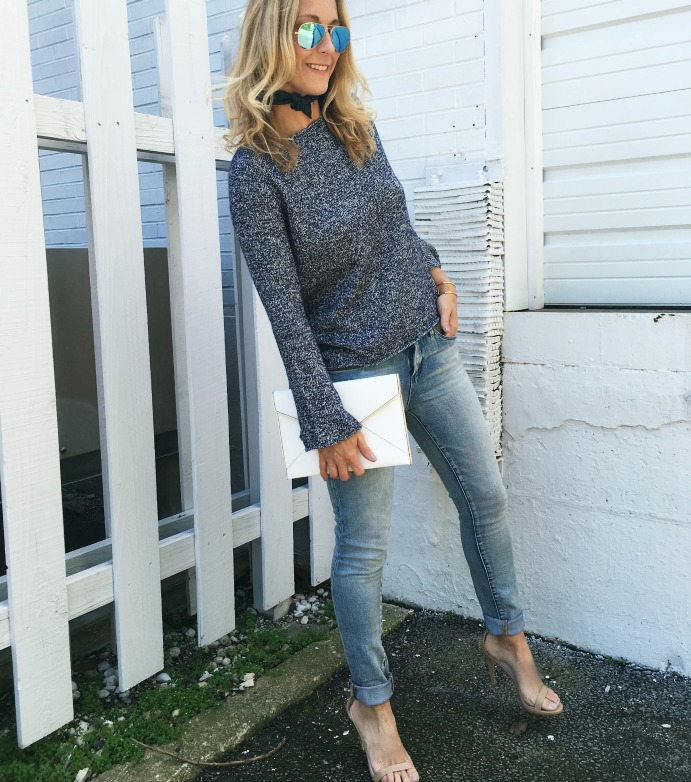 woman wearing Theory Sweater and jeans from june style board woman wearing Theory Sweater and jeans from june style board