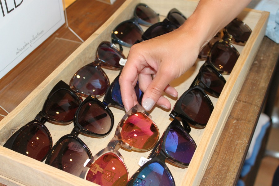 hand holding sunglasses hand holding sunglasses