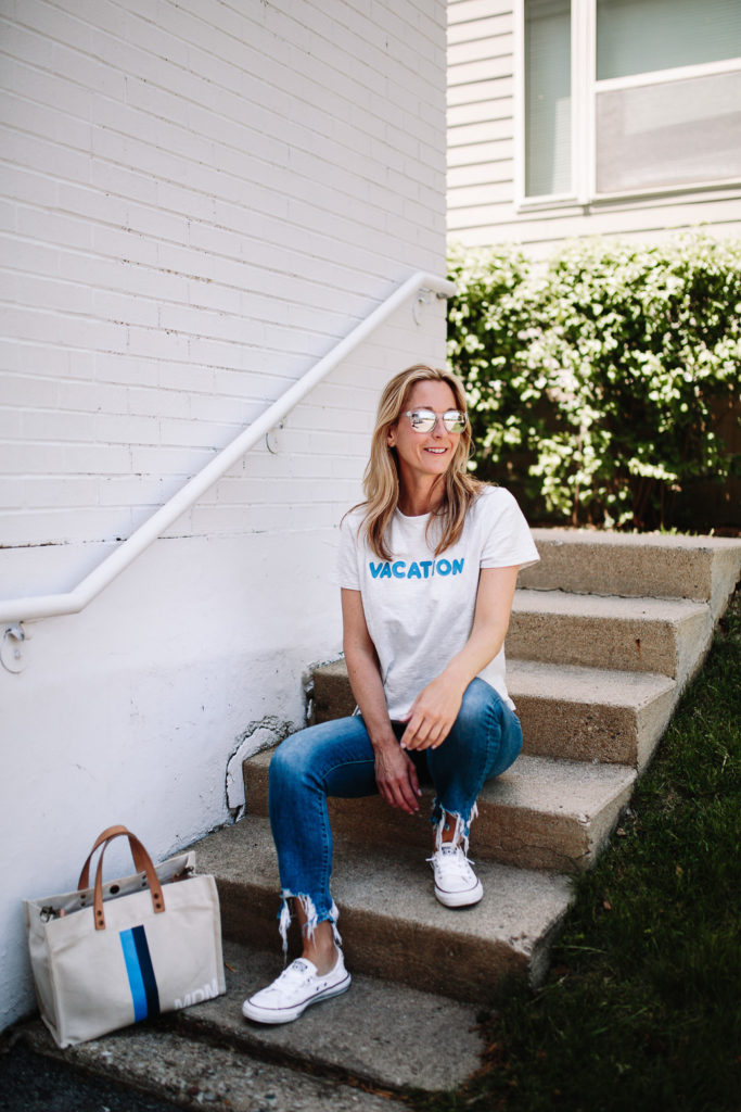 woman sitting woman spending Summer in Chicago and sitting on stairs