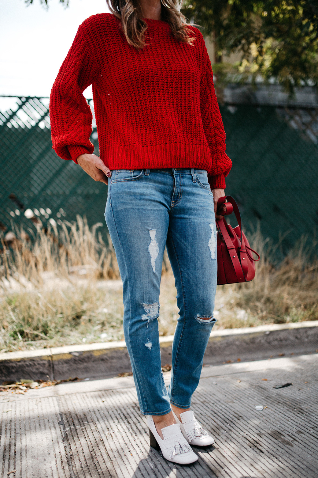 a knitted red sweater with long sleeves and a high neck, 5 Sweaters Needed For Fall