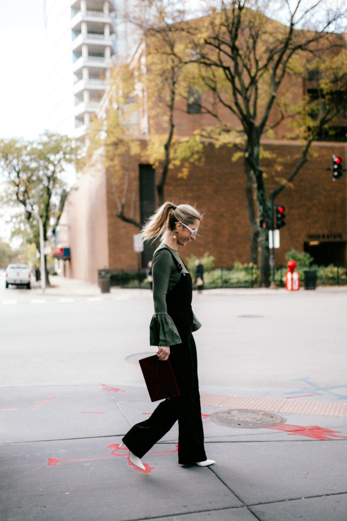 woman walking down the street woman walking down the street