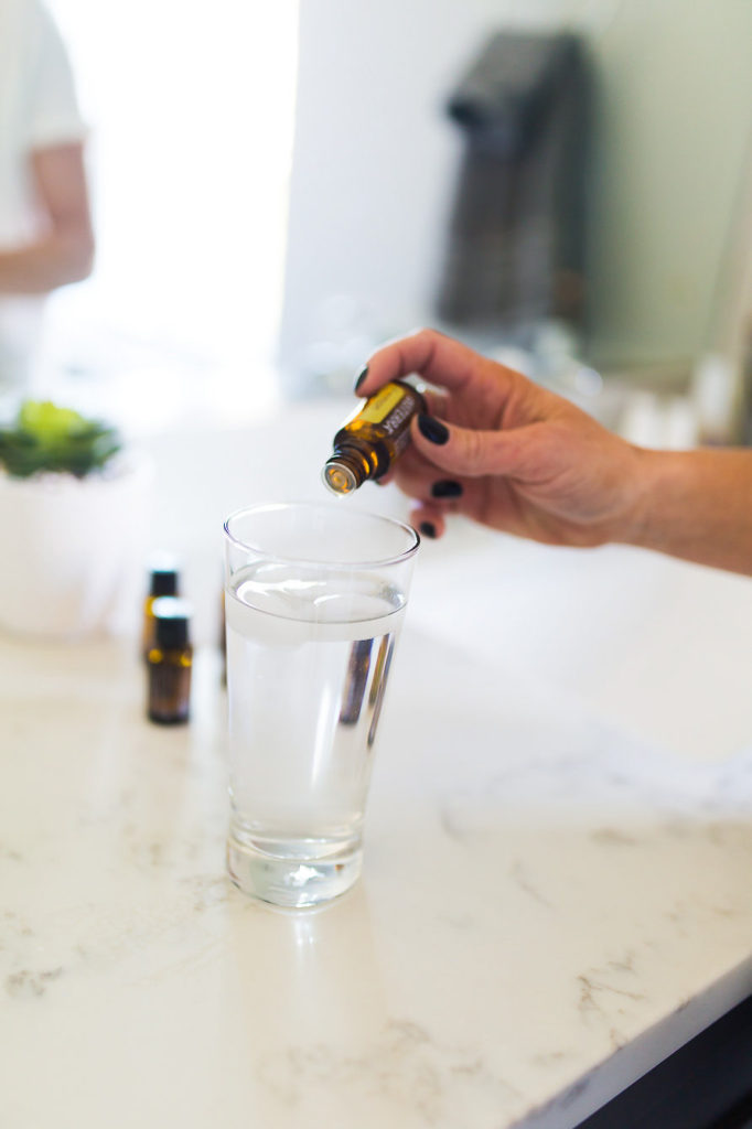 Adding Essential Oil Lemon to Water Adding Essential Oil Lemon to Water
