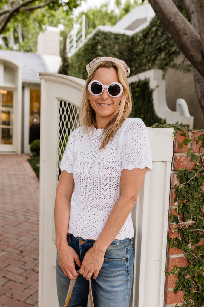 woman wearing white top eyelet clothing for spring woman wearing white top eyelet clothing for spring