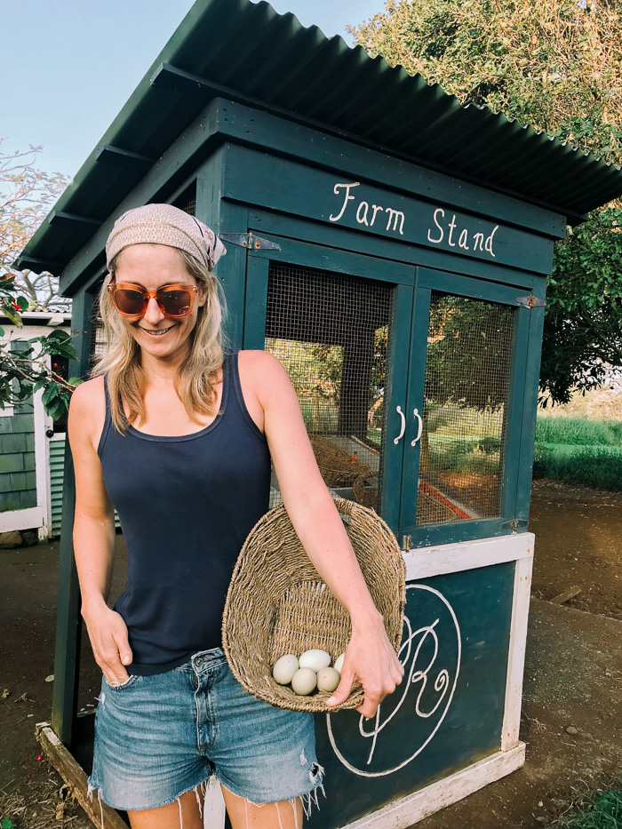 woman wearing Navy Tank Top, Denim Shorts, Bandana in Hair woman wearing Navy Tank Top, Denim Shorts, Bandana in Hair